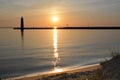 Muskegon lighthouse with a bright sunset