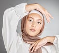 Muslim, arabic and woman beauty, makeup or glowing skin, cosmetics and aesthetic wellness on studio background. Portrait