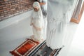 Muslim asian mother and daughter praying