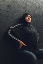 Muslim asian woman in hijab exercizing in a gym. Royalty Free Stock Photo