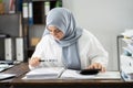 Muslim Auditor Woman Doing Fraud Audit Royalty Free Stock Photo