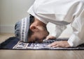 Muslim boy praying in Sujud posture