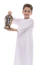 Muslim Boy In White Djellaba with Lantern Celebrating Ramadan