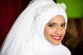 Muslim bride young beautiful beauty white wedding dress headscarf portrait smile Royalty Free Stock Photo