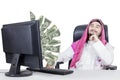 Muslim businessman looking money on monitor Royalty Free Stock Photo