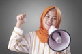 Muslim Businesswoman Calling or Offering Something with Megaphone, Advertising Marketing Concept Royalty Free Stock Photo