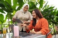 muslim businesswoman discuss about work with her coworker