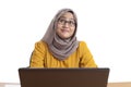 Muslim Businesswoman Working on Laptop at the Office, Thinking Gesture Royalty Free Stock Photo