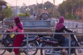 Muslim Cambodian women on motorbikes at SIEM REAP city district