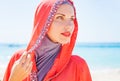 Muslim caucasian (russian) woman wearing red dress