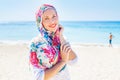 Muslim caucasian (russian) woman wearing red dress Royalty Free Stock Photo