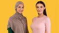 Muslim Women Posing Wearing Hijab And Modern Clothes In Studio Royalty Free Stock Photo