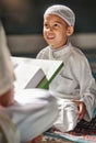 Muslim child, mosque and quran with teacher for spiritual learning, development or growth on carpet. Islamic teaching