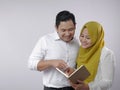 Muslim Couple Analyzing Financial Management Report Royalty Free Stock Photo