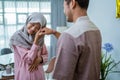 muslim couple apologizing on idul fitri day