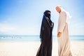 Muslim couple on a beach