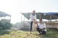 Muslim couple buy a goat for eid adha sacrifice or idul qurban