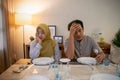 muslim couple having break fast or sahur in the morning