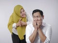 Muslim Couple Having Conflict, Husband Afraid to His Wife Concept Royalty Free Stock Photo