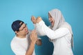 Muslim Couple Having Conflict, Husband Afraid to His Wife Concept Royalty Free Stock Photo