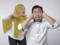 Muslim Couple Having Conflict, Husband Ignoring His Wife Screaming Royalty Free Stock Photo