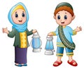 Muslim couple kid waving hand with holding lantern Royalty Free Stock Photo