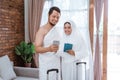 Muslim couple making a phone call while umrah and hajj Royalty Free Stock Photo