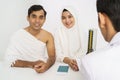 Muslim couple medical checkup for hajj and umrah