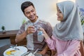 muslim couple having breakfast or sahur early morning