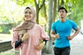 muslim couples doing jogging together when outdoor exercise