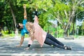 muslim couples in gym clothes doing hand exercises