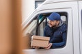 muslim delivery man with carton box