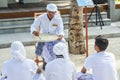 Muslim dhivehi orthography teacher giving lesson to his students