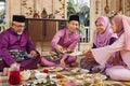 Muslim family feasting during the Eid celebration Royalty Free Stock Photo