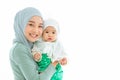 Muslim family or Islam mother with baby standing on white background space for text Royalty Free Stock Photo