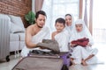 Muslim family packing for umrah and hajj