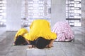 Muslim family posing prostration in the mosque Royalty Free Stock Photo