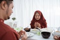 Muslim family pray when breaking fast Royalty Free Stock Photo