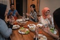 Muslim family pray before dinner Royalty Free Stock Photo