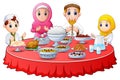 Muslim family pray together before break fasting