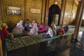 Muslim family praying at the family temple