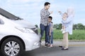 Muslim family quarreling on the roadside