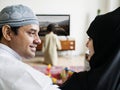 Muslim family relaxing in the home Royalty Free Stock Photo