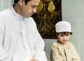 Muslim family relaxing in the home Royalty Free Stock Photo