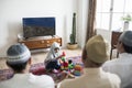 Muslim family relaxing and playing at home Royalty Free Stock Photo