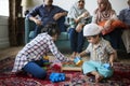 Muslim family relaxing and playing at home Royalty Free Stock Photo