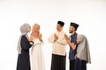 muslim family shake hand on idul fitri celebration