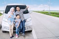 Muslim family with tablet on the highway Royalty Free Stock Photo