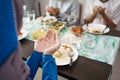 Muslim family together pray before meals Royalty Free Stock Photo