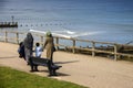 Muslim family walking on the beach